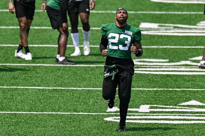 New York Jets safety Chuck Clark jogs at OTAs